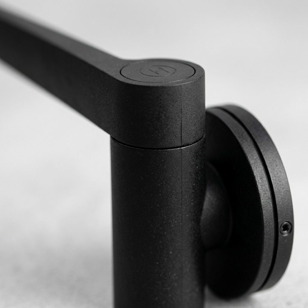Macro detail of the black bio-composite Happy Sinks Dishcloth Holder showing its matte grain texture.