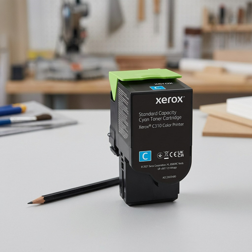 A Xerox 006R04357 cyan toner cartridge positioned beside a commonly understood object for size comparison.